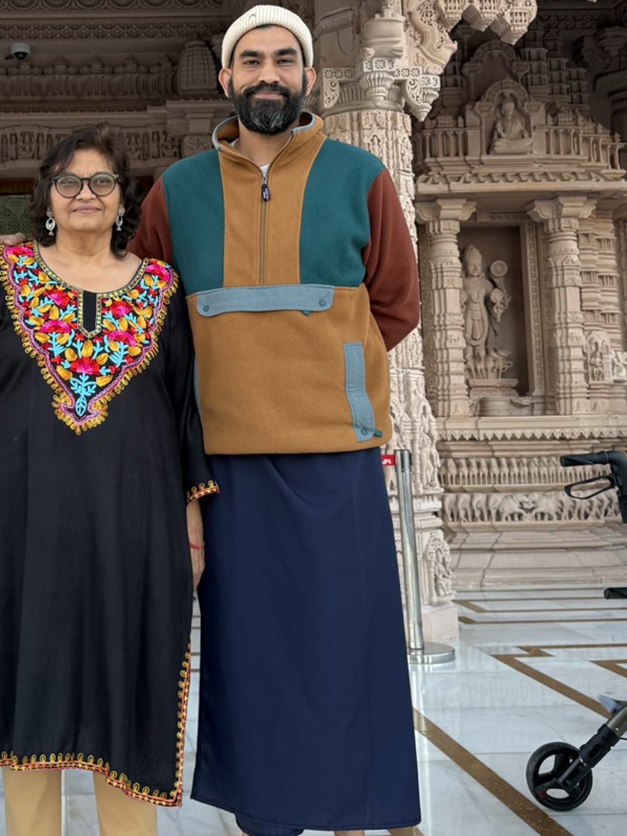My mom and me outside a carved stone temple